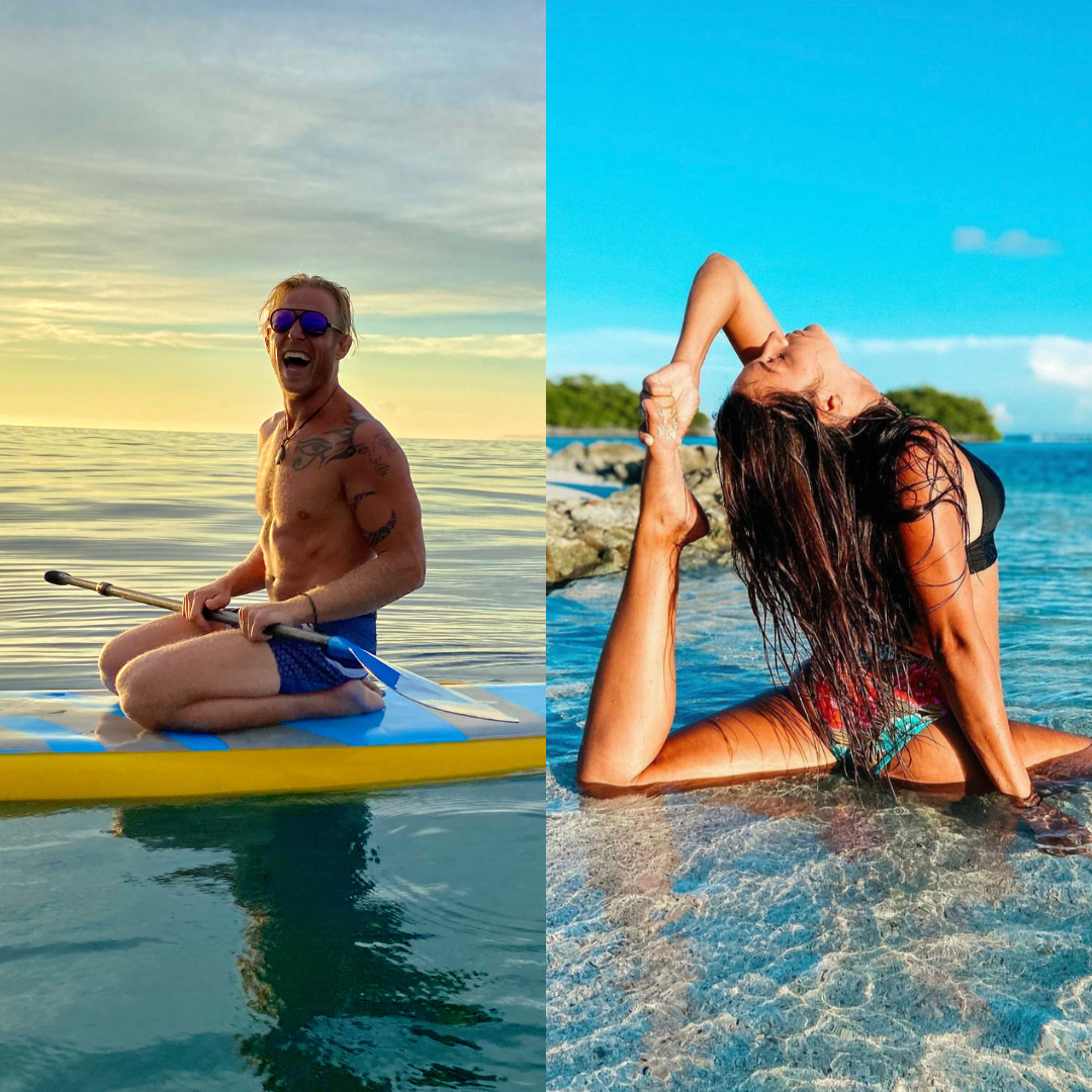 Male on paddle board at sunset and female doing yoga on beach at sunset